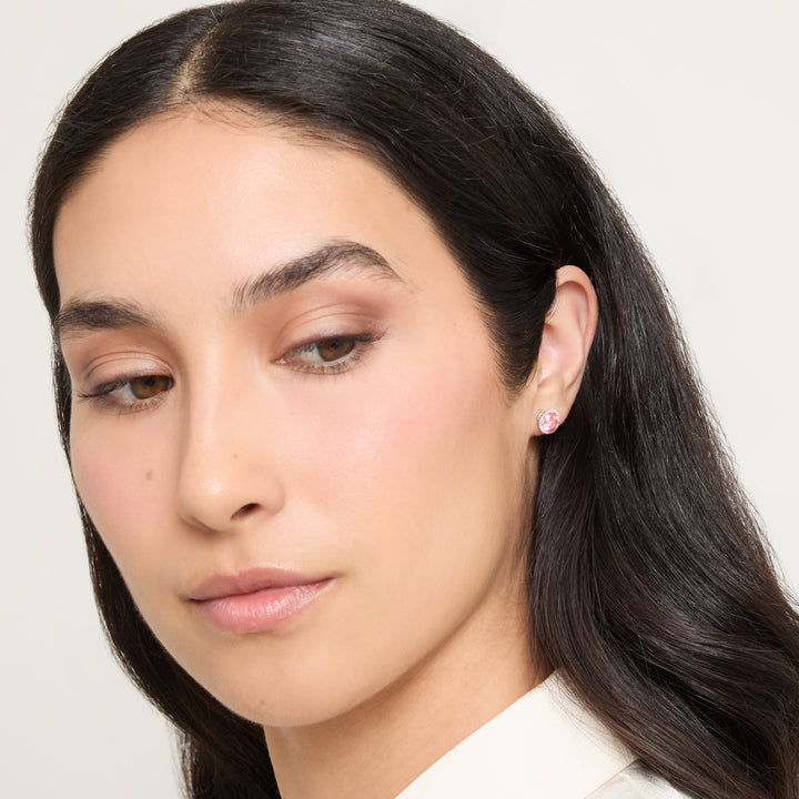 Model wearing Eclipse Luna Halo Earrings shown in styled position