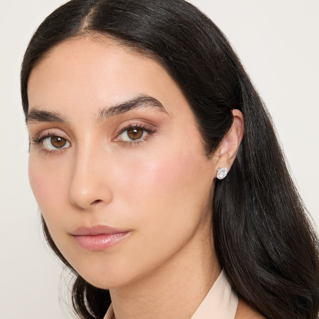 Model wearing Eclipse Luna Starburst Earrings shown in styled position