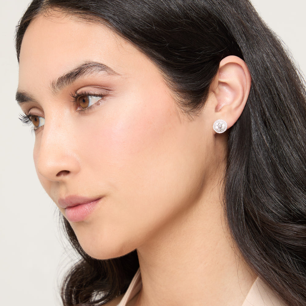 Eclipse Luna Starburst Earrings worn alone by model against neutral background