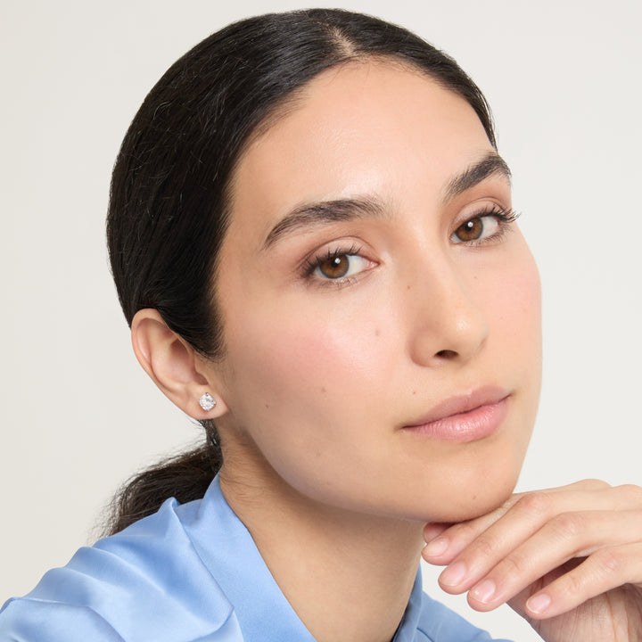 Model wearing Eclipse Celeste Earrings shown in styled position