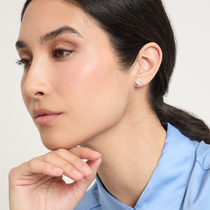 Eclipse Luna Earrings worn alone by model against neutral background