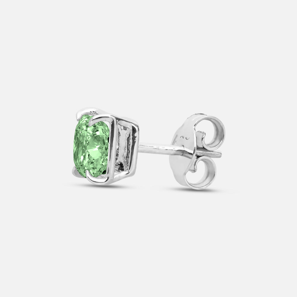 Close-up of green diamond details on Eclipse Celeste Earrings