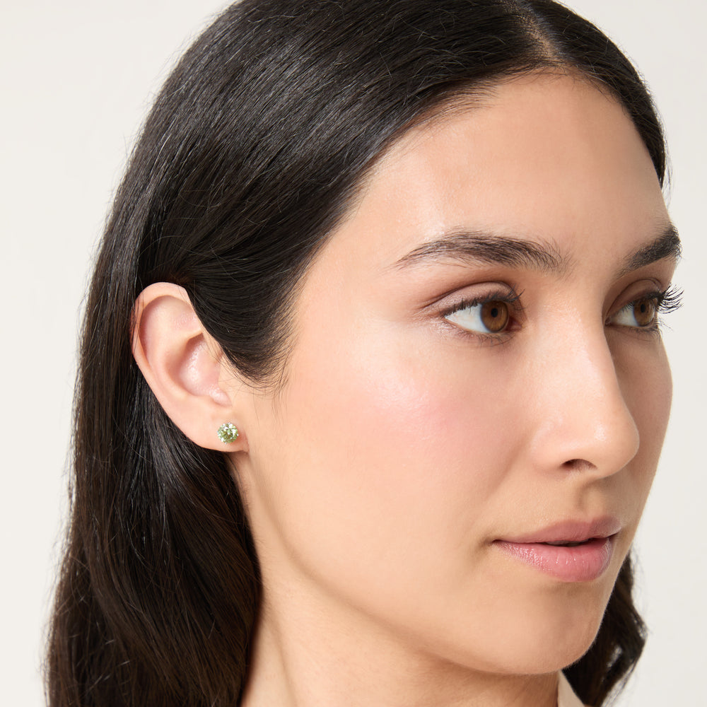 Model wearing Eclipse Luna Earrings shown in styled position