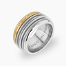 Silver ring with gold band featuring 'Marco Dal Maso' branding on a white background
