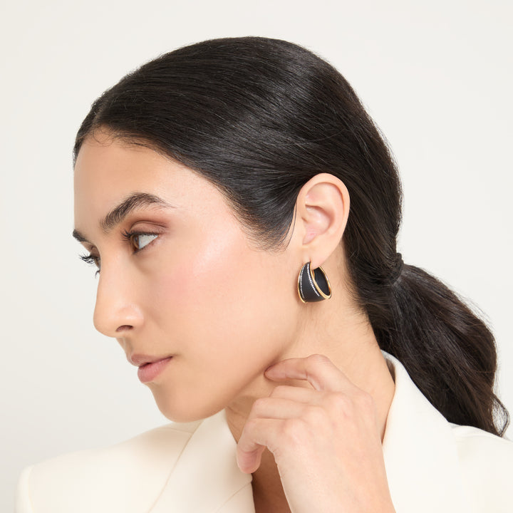 Model wearing Eclipse Dawn Hoops shown in styled position