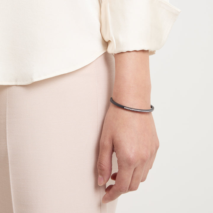 Model wearing ECLIPSE Equinox Cuff shown in styled position