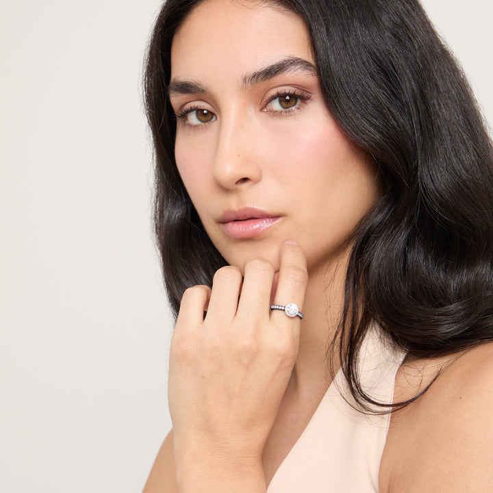 Model wearing Eclipse Luna Halo Ring shown in styled position
