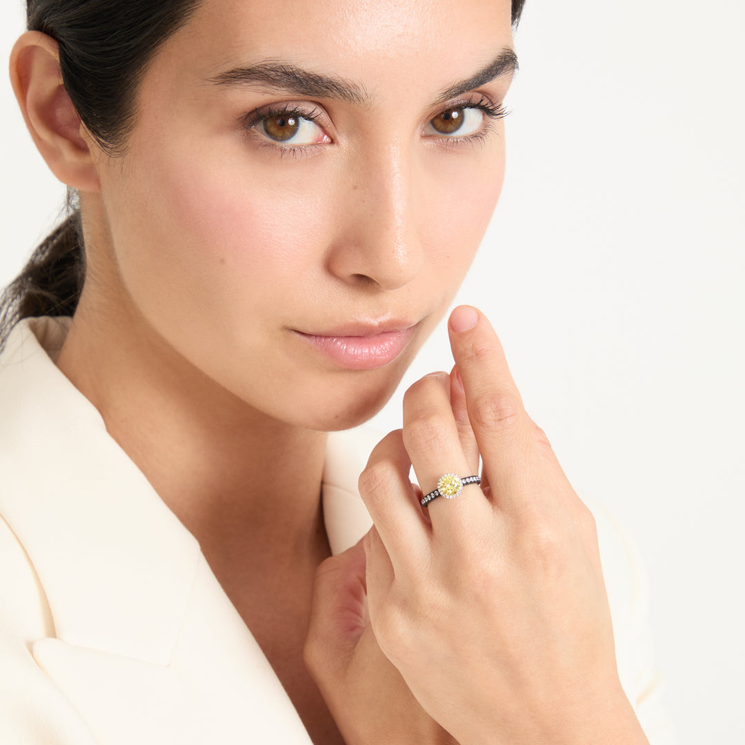 Model wearing Eclipse Luna Halo Ring shown in styled position