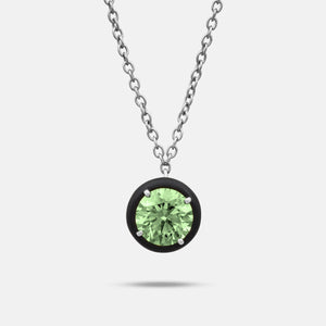 Close-up of green diamond details on Eclipse Black Luna Pendant