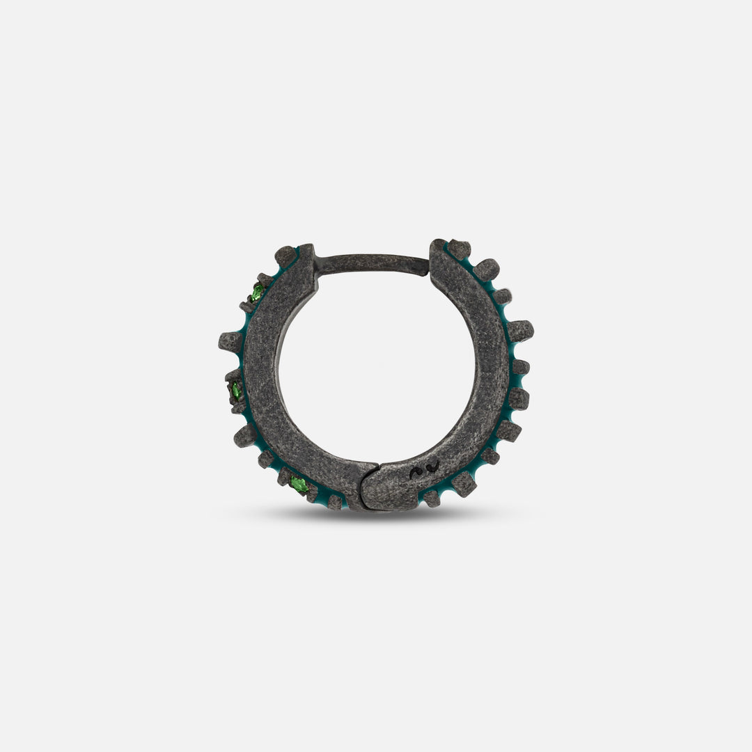 MARCO DAL MASO Acies Mini Pavé Hoop Earring in oxidized silver with green enamel and tsavorite gemstones, shown in a side-profile view highlighting the hoop structure and gemstone settings.