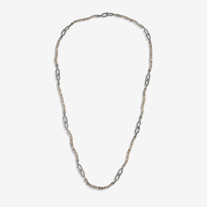 Beaded necklace in earth tones and silver links on light display.