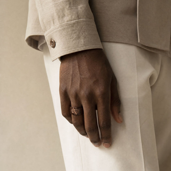 Triumph Legacy Ring in 18K rose gold vermeil with brown enamel worn by a model.