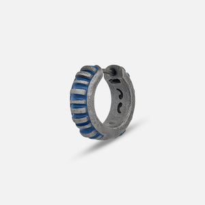 MARCO DAL MASO Acies Mini Hoop Earring in oxidized silver with blue enamel detailing, shown in an angled product view against a light background.