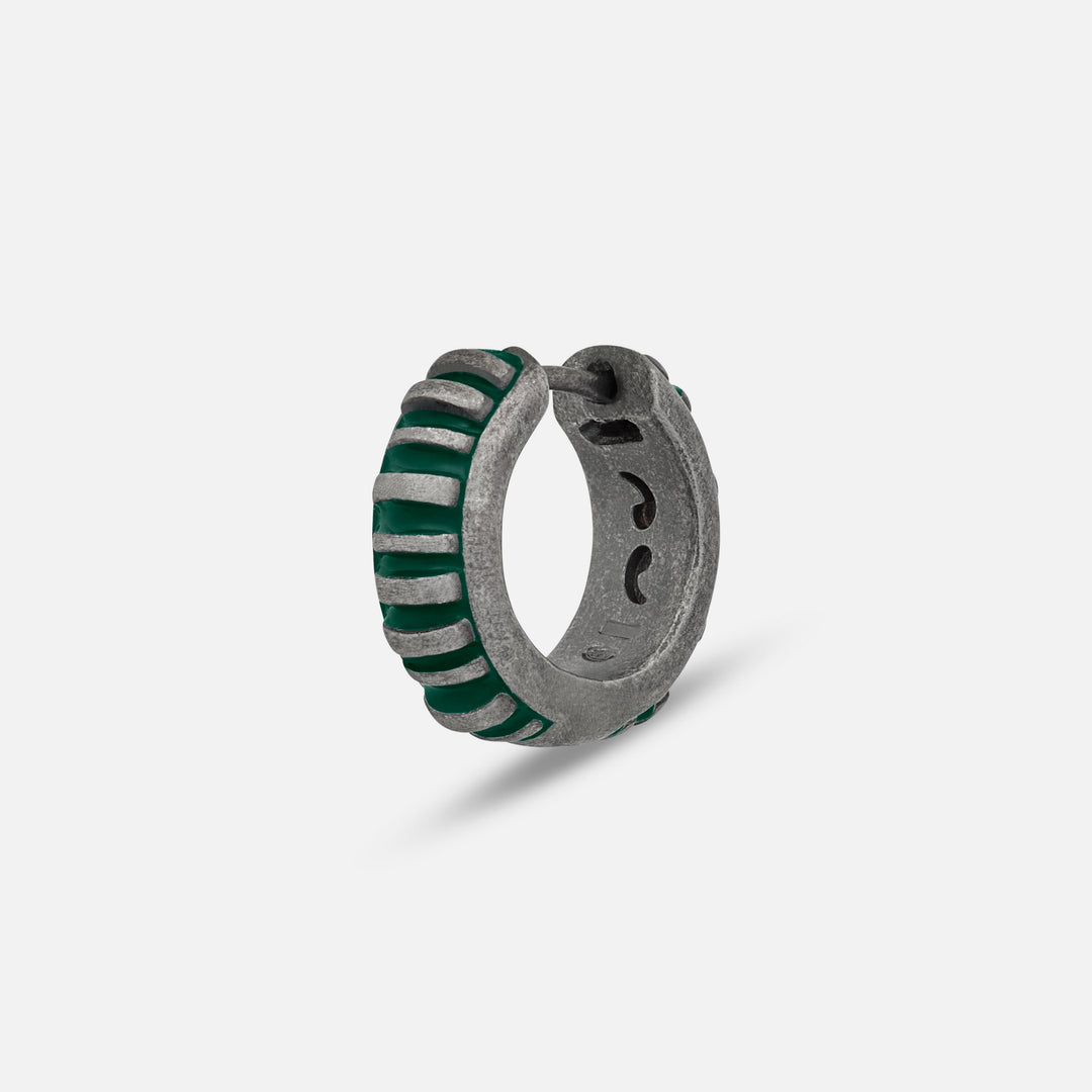 MARCO DAL MASO Acies Mini Hoop Earring in oxidized silver with green enamel detailing, featuring a ribbed hoop design, shown in an angled product view against a light background.