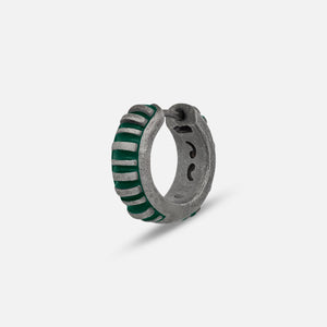MARCO DAL MASO Acies Mini Hoop Earring in oxidized silver with green enamel detailing, featuring a ribbed hoop design, shown in an angled product view against a light background.