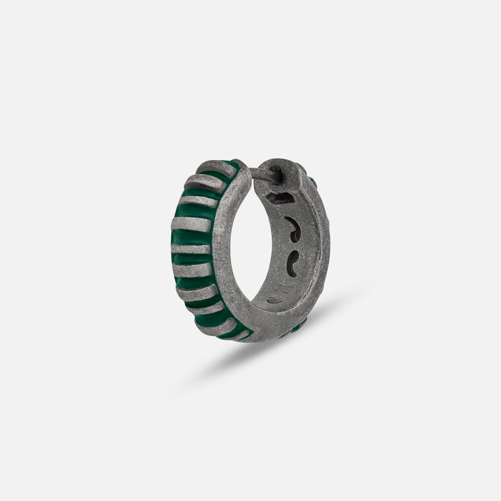 MARCO DAL MASO Acies Mini Hoop Earring in oxidized silver with green enamel detailing, featuring a ribbed hoop design, shown in an angled product view against a light background.