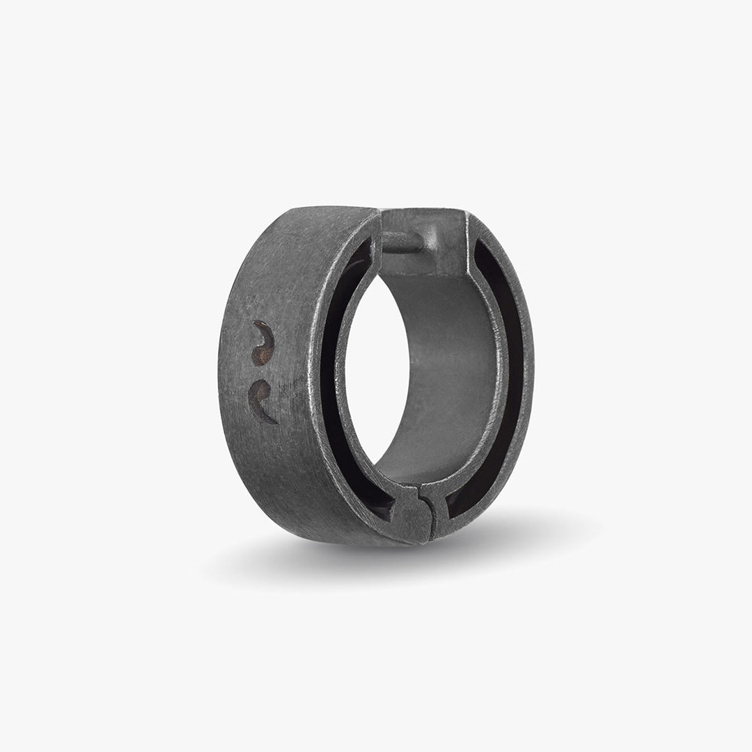 MARCO DAL MASO Dark textured hoop earring shown from the side.
