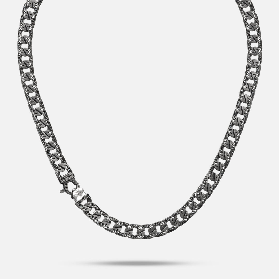 Necklace with ornate repeating links and a silver-tone clasp.