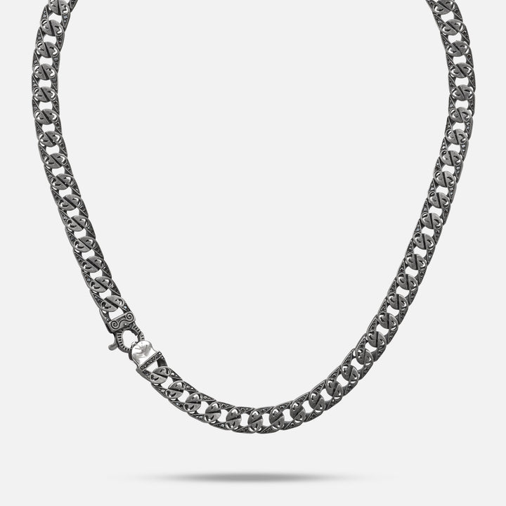 Necklace with ornate repeating links and a silver-tone clasp.