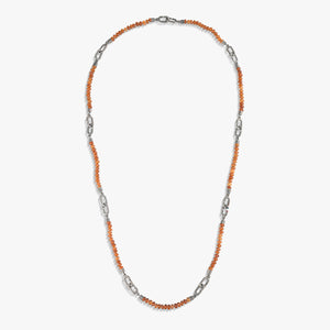Chain strand in amber stones and steel links on minimal background.