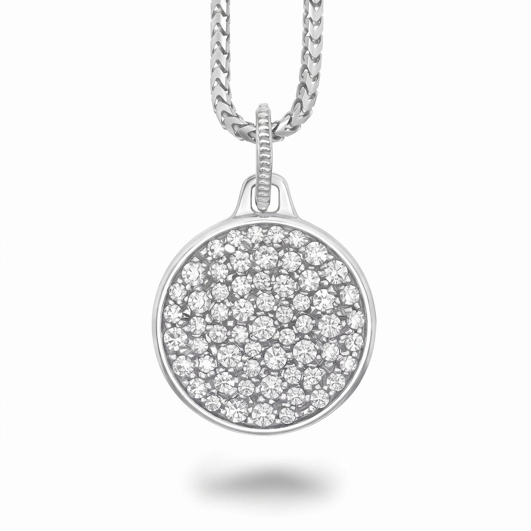 Close-up of the Moneta Gemstone Pendant in polished silver with white diamonds.