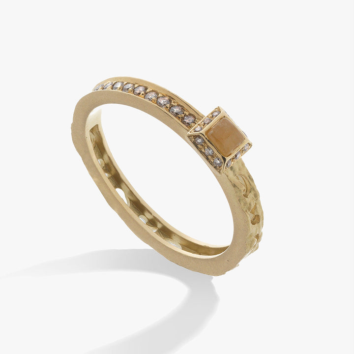 MARCO DAL MASO Orion Square Gemstone Ring in yellow gold, featuring a square yellow sapphire setting and champagne diamond accents along a textured band, shown in an angled product view.