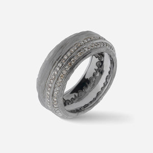 Dark ring with two rows of white stones and engraved details.