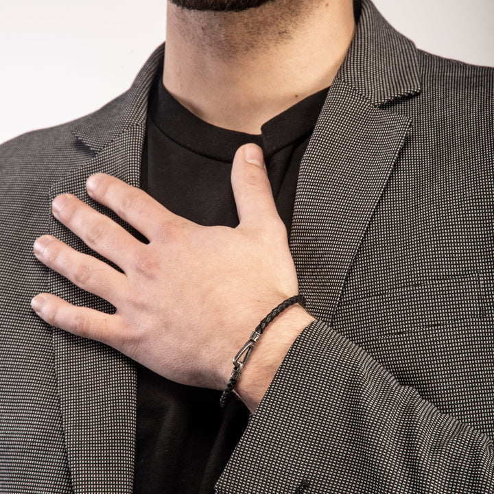 LASH Braided Bracelet in oxidized silver with black braided leather, shown on a model.