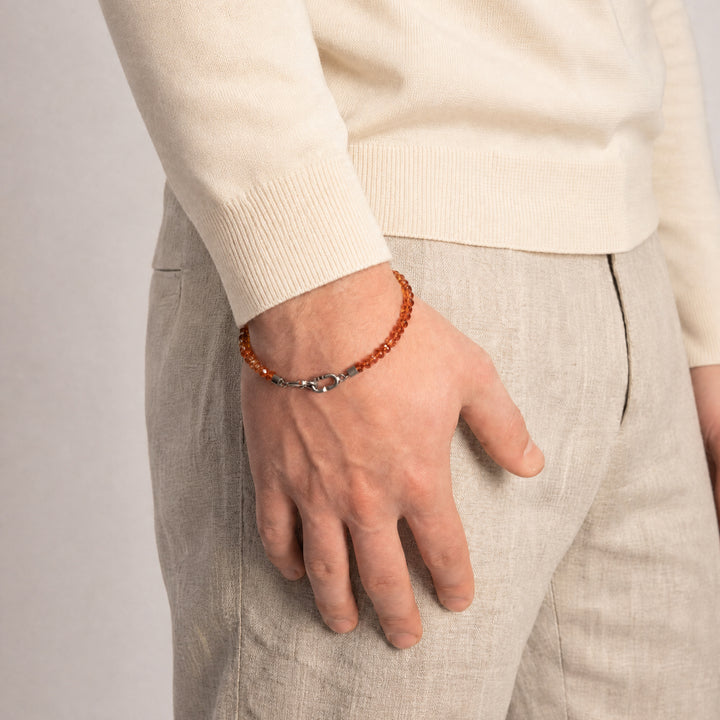 Model wearing the LINK Mini Beads Eternity Bracelet featuring citrine beads.
