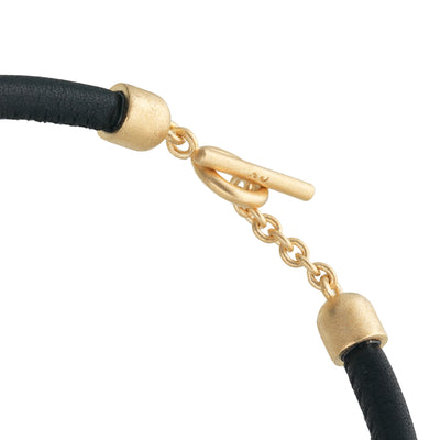 ACIES 18K Yellow Gold Vermeil Roller Bracelet with black enamel and leather
